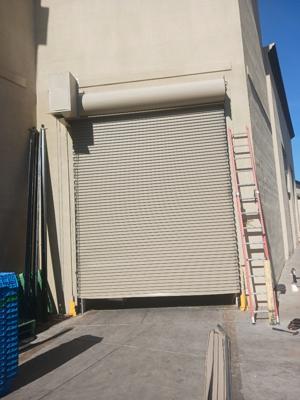 After — Commercial Roll-Up Door Repair After Delivery Truck Impact