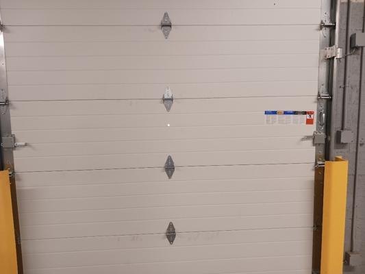 After — Commercial Sectional Garage Door Installation - Aldi