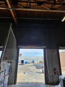 Loading dock with commercial door open interior view