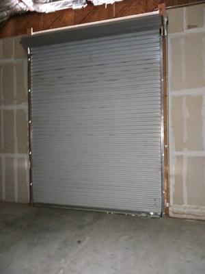 Commercial Garage Door General Service and Hinge Replacement