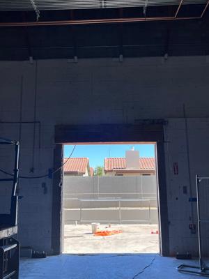 Before — Commercial Sectional Garage Door Installation - Aldi