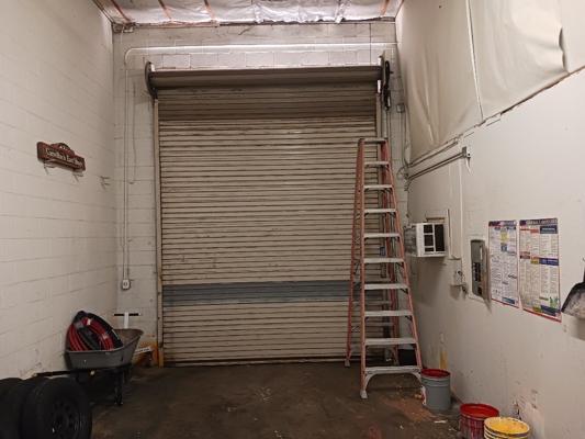 Before — Commercial Roll-Up Door Repair – Chain Drive Opener