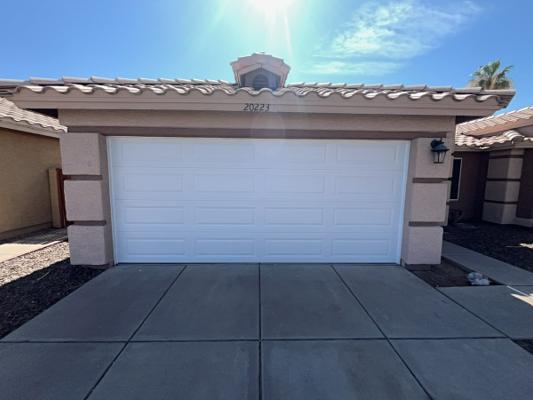 After — 16x7 Sectional Garage Door Installation with Steel Panels