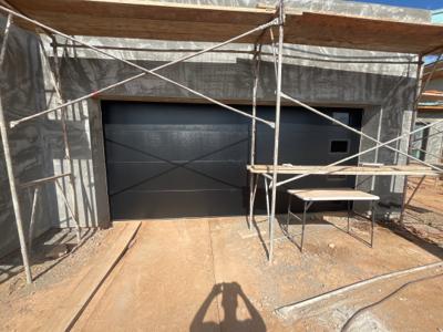New CHI garage door installed on Mesa new construction