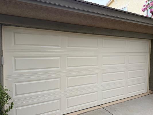 CHI Raised Panel Garage Door Replacement with Wireless Keyless Entry