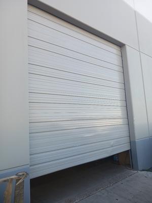 After — Commercial Roll-Up Door Repair after Forklift Impact