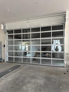 Full-view aluminum glass garage door installation