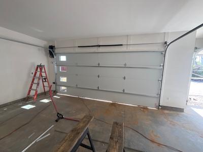 Garage door installation in progress