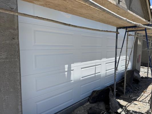 New Sectional Garage Door Installation – Dual Doors with Smart Openers