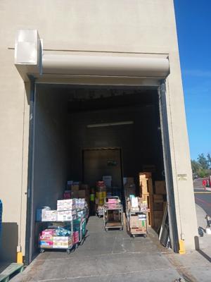 Before — Commercial Roll-Up Door Repair After Delivery Truck Impact