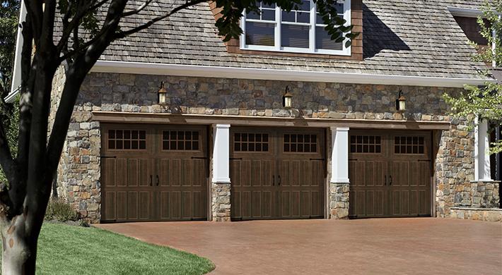Amarr Classica carriage house style garage door on stone home
