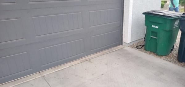 Before — Damaged Garage Door Panel Repair