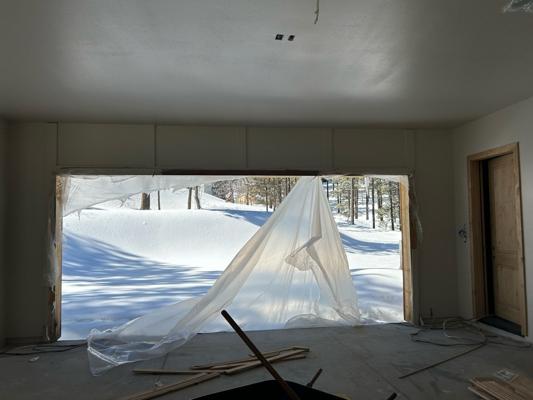Before — Custom Wood Overlay Garage Door Installation for New Build