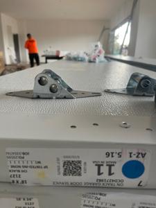 CHI door panels prepared for installation with hardware