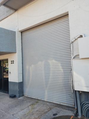 Commercial Garage Door Repair for EverLine Coatings - Damaged Door Components