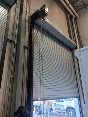 RV Center Garage Door Take-Up Reel Installation