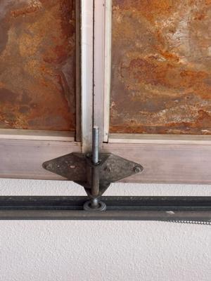 Garage Door Roller Repair for Kerry's Car Care Commercial Facility
