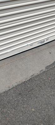 Commercial Coiling Door Installation with Guides and Seals