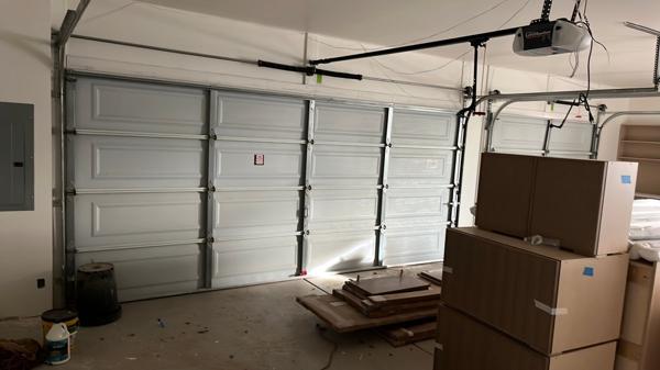Commercial Garage Door Installation: Two Modern Steel Doors for Valwest Construction